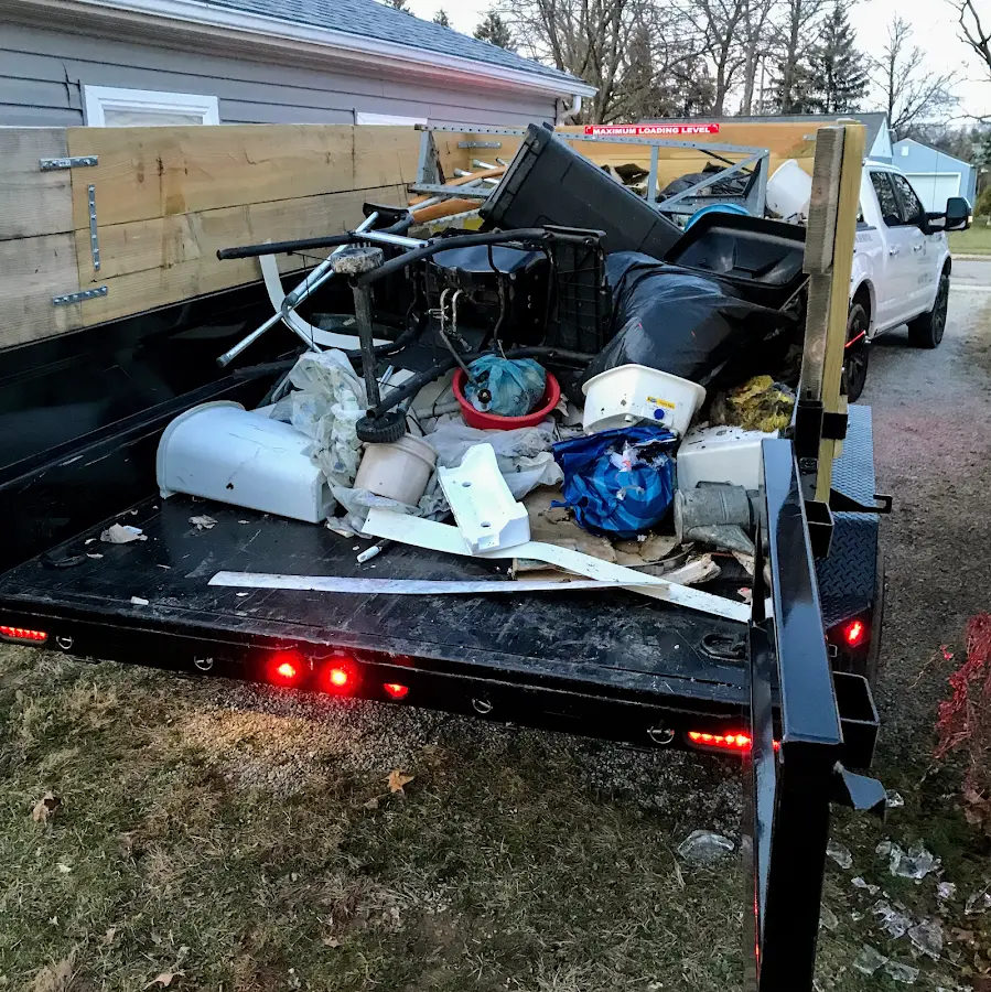 Roll-off dumpster delivered to a residential driveway in North Chicago